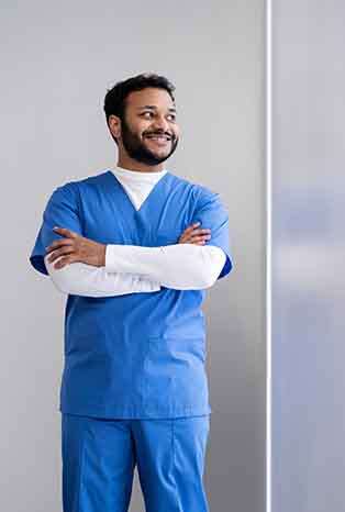 Professional male nurse delivering quality healthcare services with a caring approach