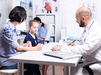 Healthcare professional reviewing and updating care plan documentation