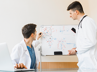 Care coordinator consulting with family members on care plan